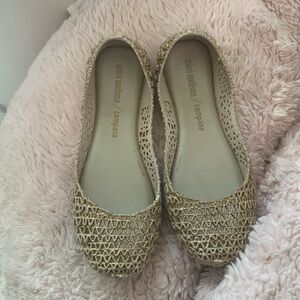 Mini Melissa flats. Really comfy. Only worn a few times.